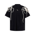Black women's T-shirt with rivet ribbon padded shoulders and short sleeves