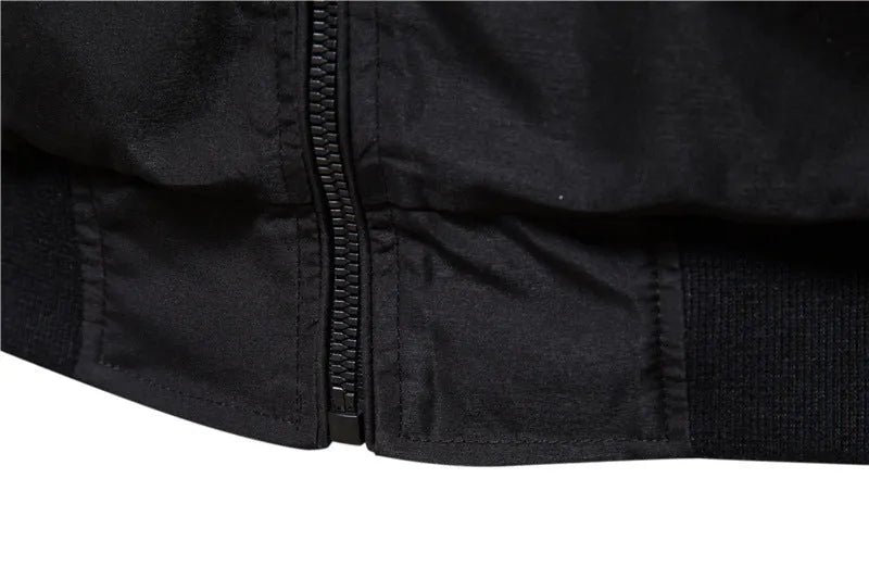 Men's solid colour thin casual jacket in polyester available in dark blue, black, or army green.
