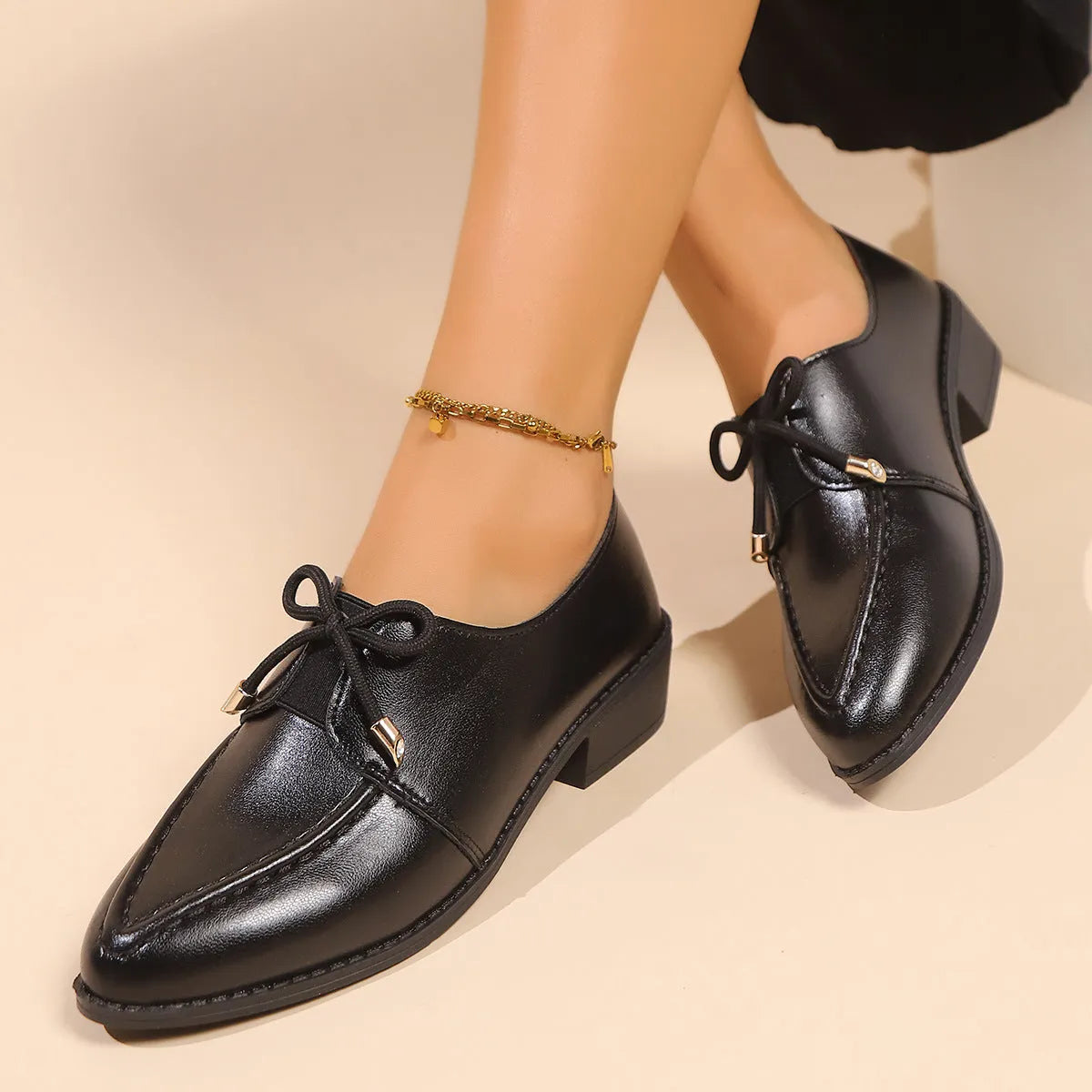 Women's British-style leather shoes with decorative bow detailing on PU upper and rubber sole