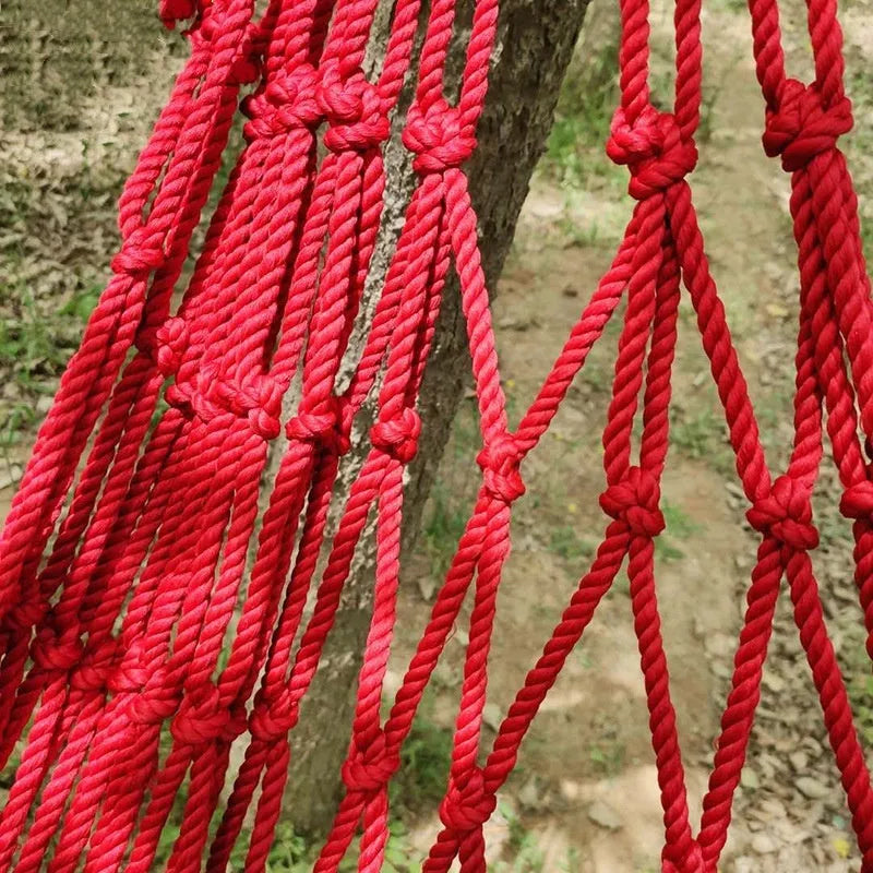 Nylon rope mesh hammock shown outdoors with dimensions 1.1m wide by 2.1m long