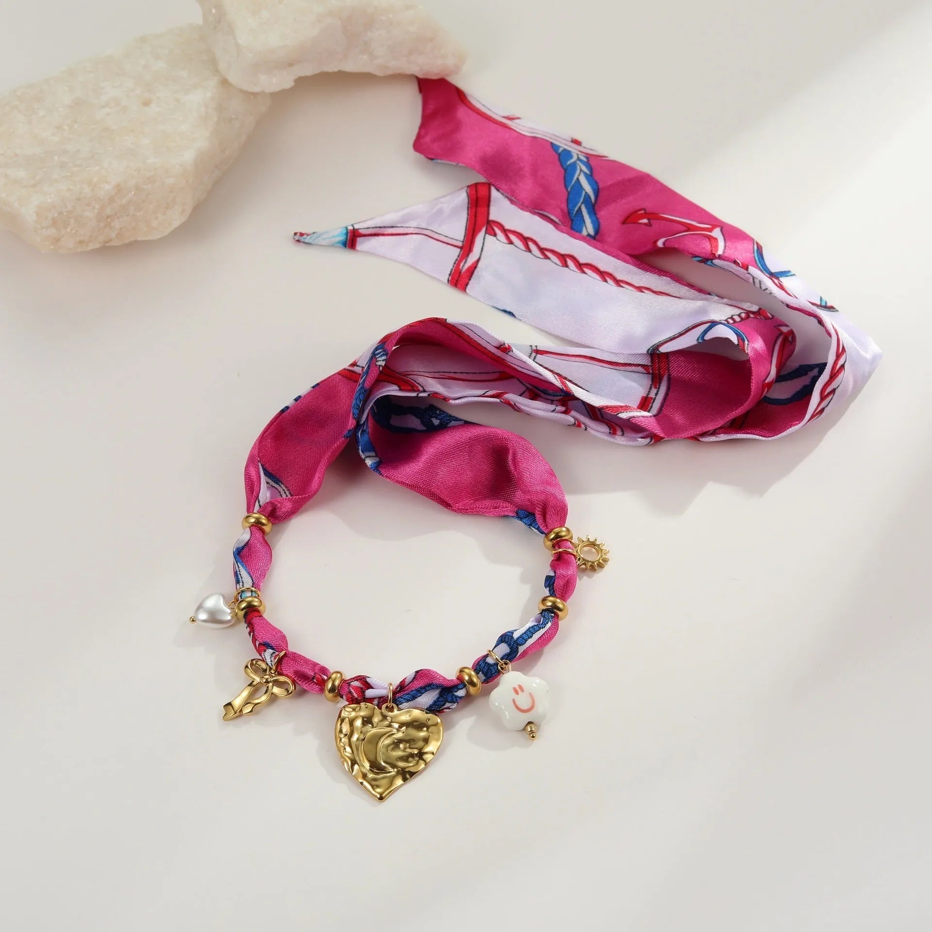 Stainless steel necklace and bracelet set with colourful silk scarf pendants on geometric designs