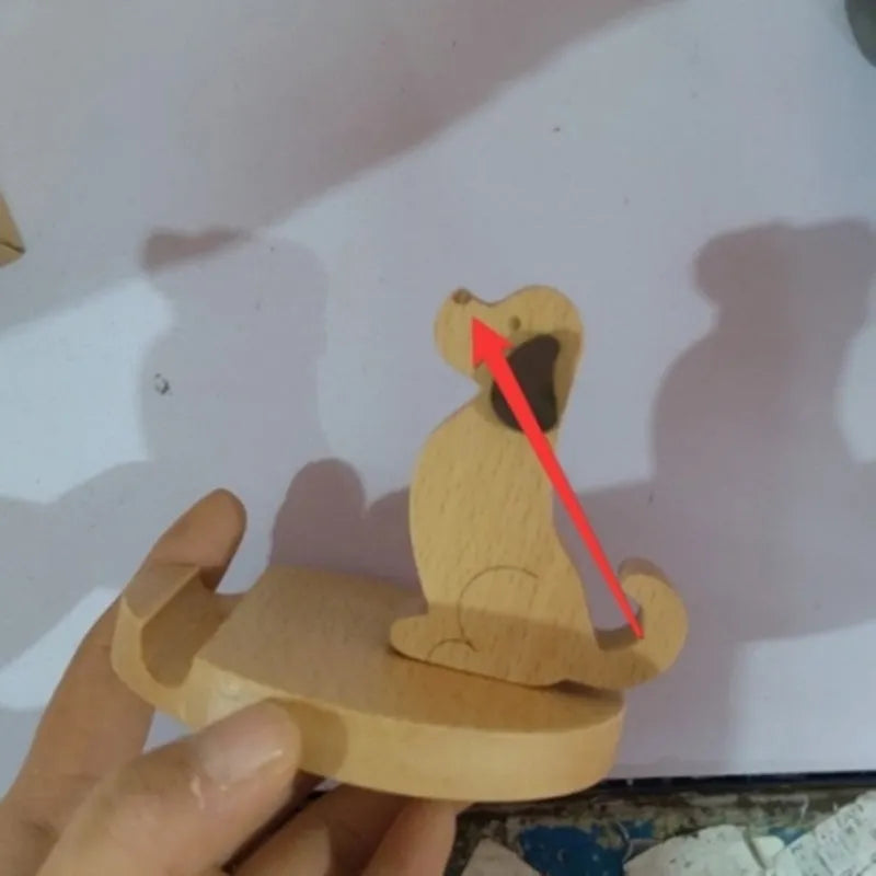 Beech wood mobile phone holder with resin animal design and coin slot