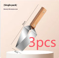 Natural colour 430 stainless steel triangle watermelon splitter with protective cover on a light background