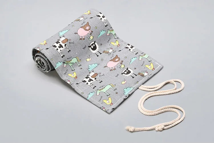 Canvas pencil wrap roll up case with elastic bands holding coloured pencils, available in multiple slot sizes