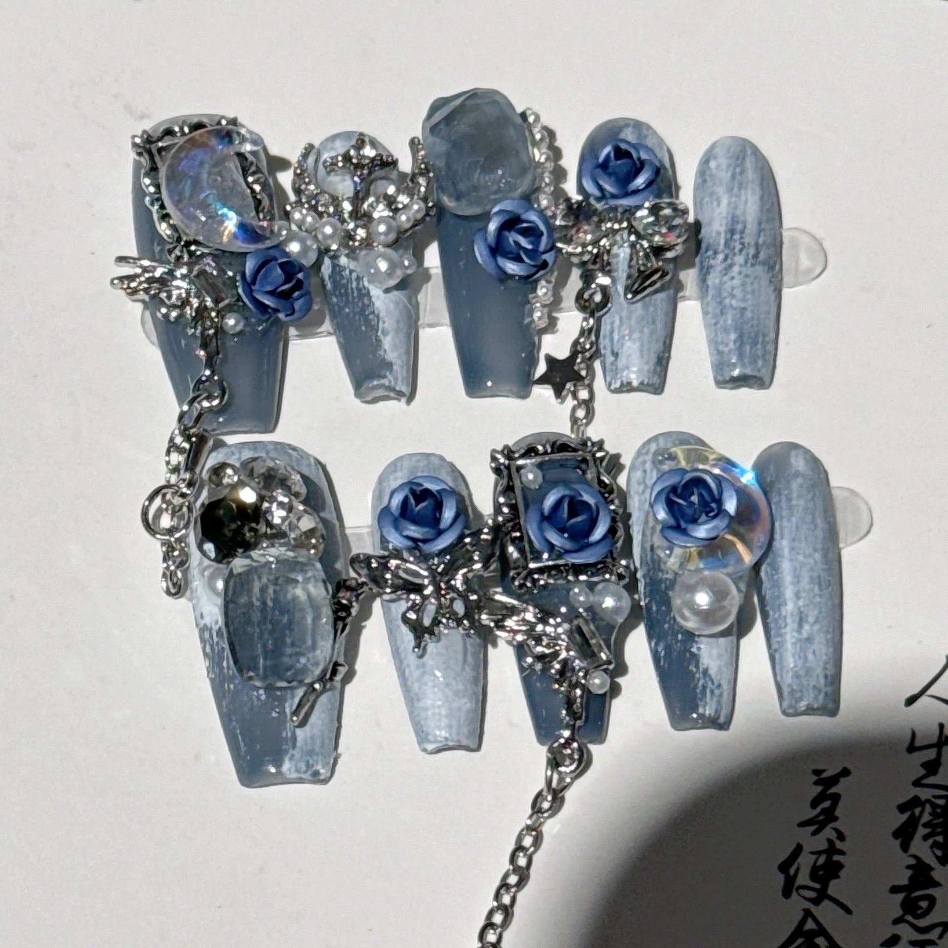 Heavy industry blue manicure set with ornate rose and tulip flower patterns