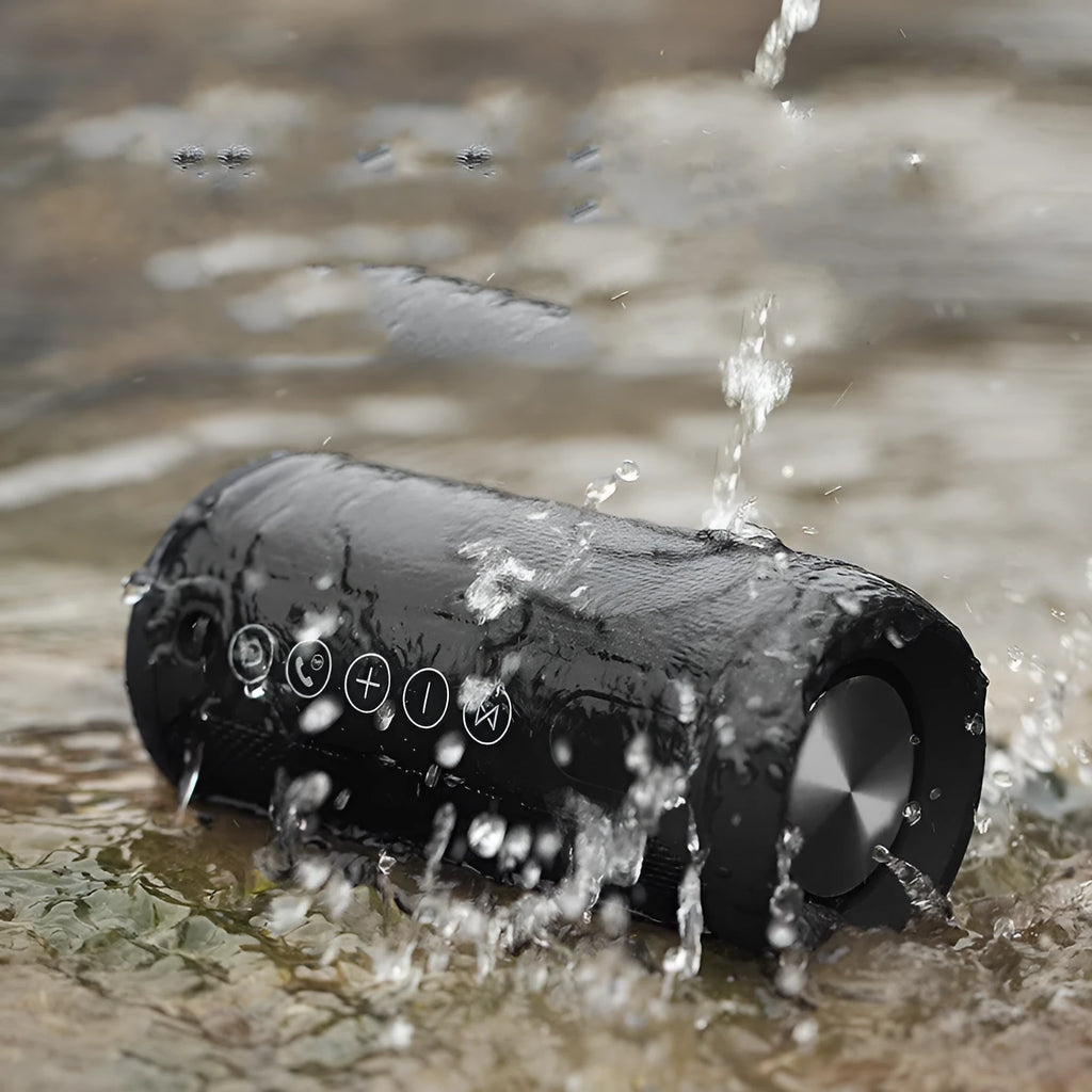 Outdoor waterproof portable Bluetooth speaker in black, camouflage, grey, or red colours with 20m range
