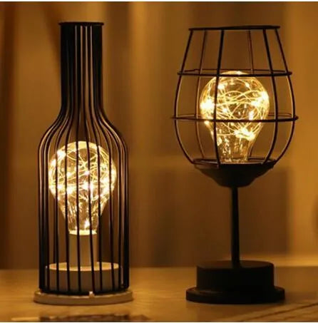 Iron hollow table lamp in red wine glass design with warm white LED lighting
