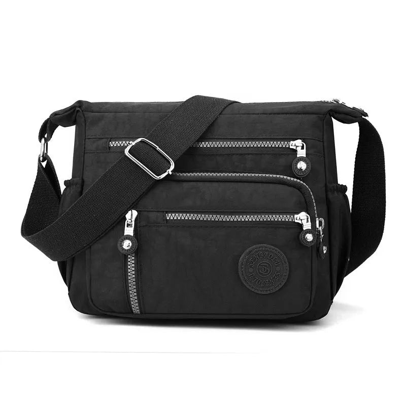 Nylon messenger bag with square vertical shape in one of five colour options