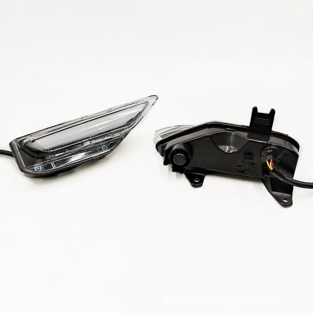 Infiniti Q50 Q70 front bumper LED daytime running and turn signal light unit with ABS housing.