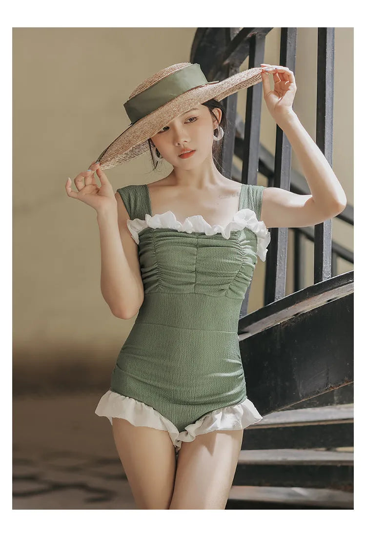 Triangle quick-drying slimming one-piece swimsuit in black with high-waist design Korean style