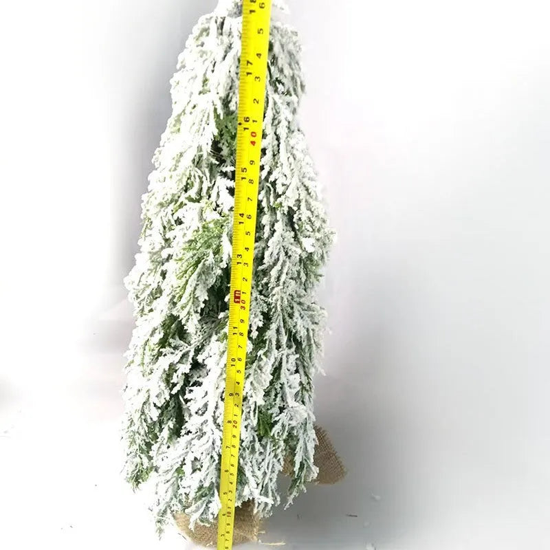 24-inch green PE plastic Christmas tree with lights and snow spray decoration on desktop