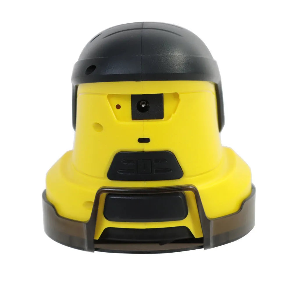 Yellow cordless electric car ice scraper with USB charging cable on a car windshield.