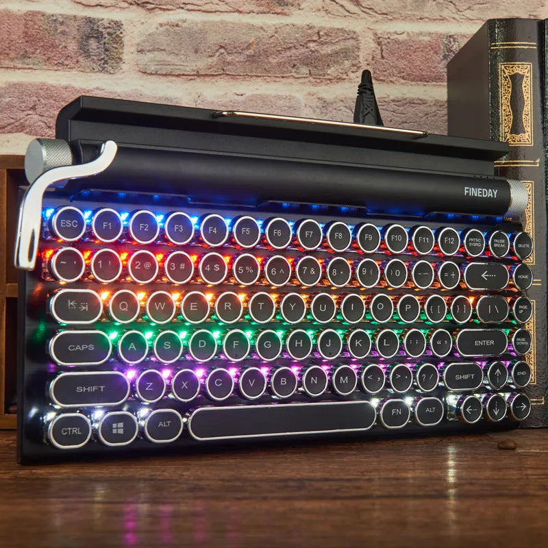 Black Dot retro-style mechanical keyboard with backlit keys on a desk.
