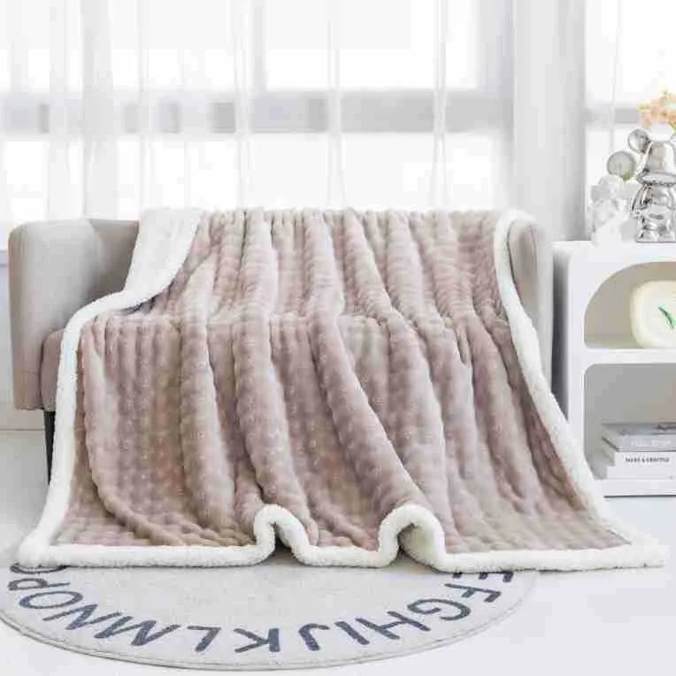 Bubble double layer thick lambskin blanket in beige on a sofa