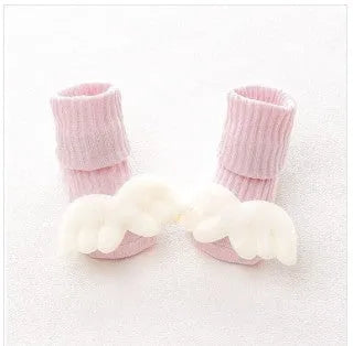 Cotton baby floor socks in multiple patterns including blue bow and lion designs