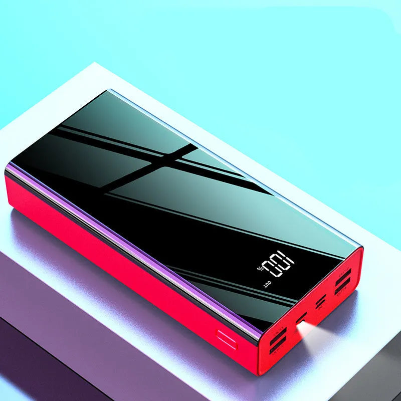 Black and red 40000mAh power bank with LCD screen showing battery percentage