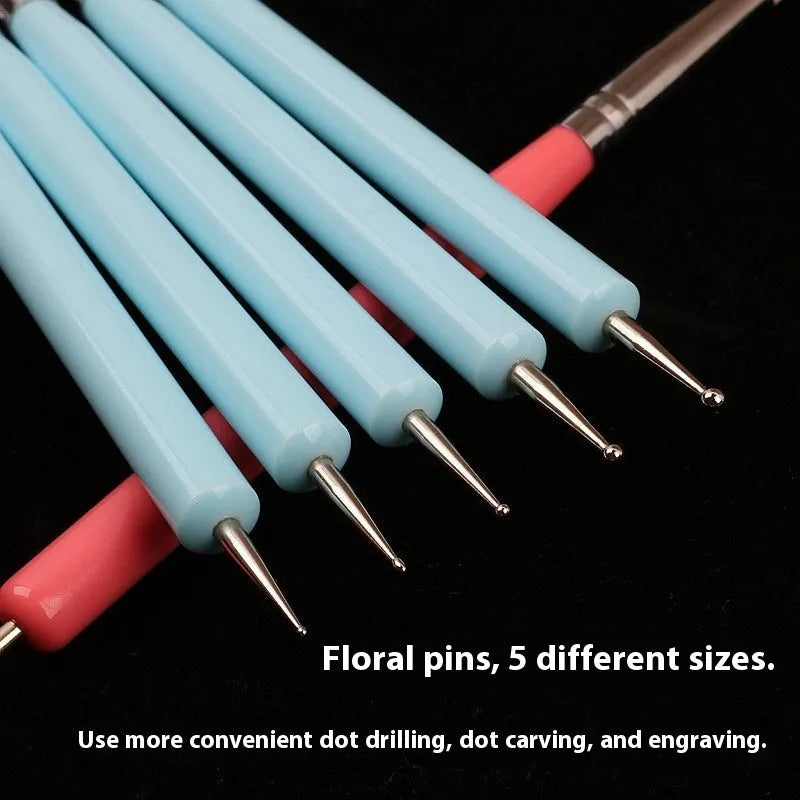 Five blue silicone double point electric drill pens for manicure painting set on light background