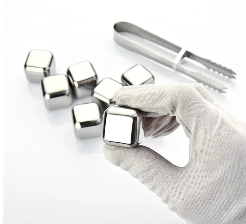 8-piece stainless steel whiskey stones set with tongs in plastic box, various shapes including squares and diamonds