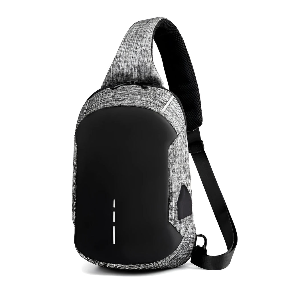 Small dark blue waterproof oxford cloth chest bag showing front zipper closure and strap