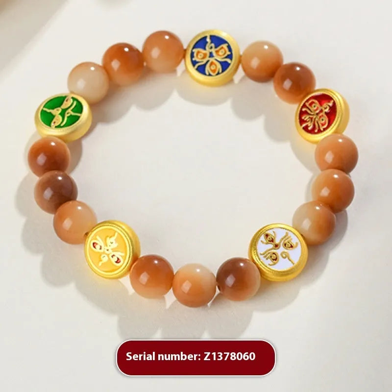 Handmade bodhi seed bracelet with yellow round beads in geometric five-directions design