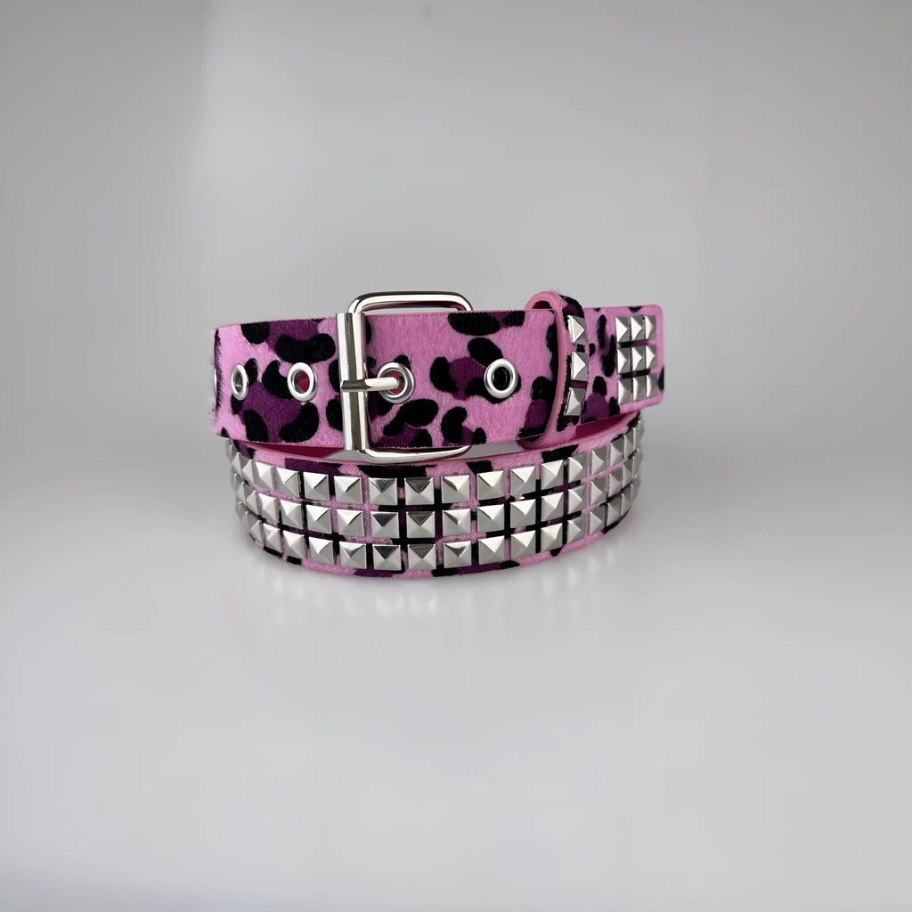 Punk women's belt with metal rivets in leopard or zebra print patterns showing alloy buckle