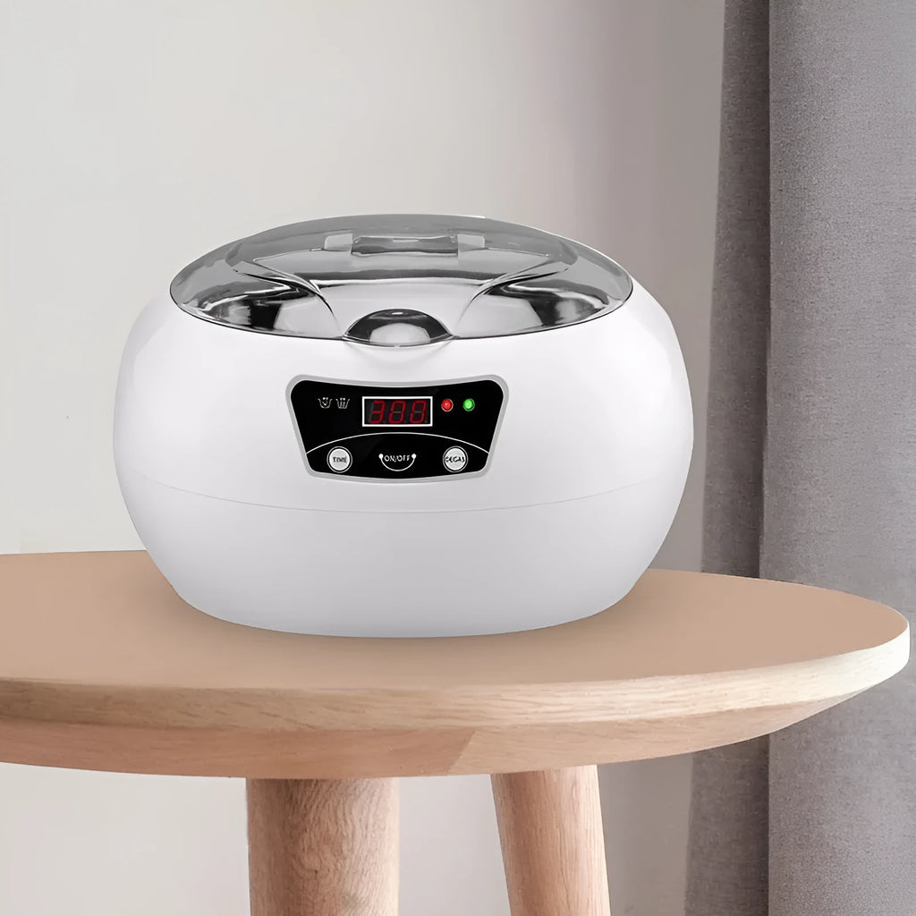 White blue ultrasonic cleaning machine for home use, 20.6cm x 15.2cm x 13.2cm, with digital control panel on a kitchen counter