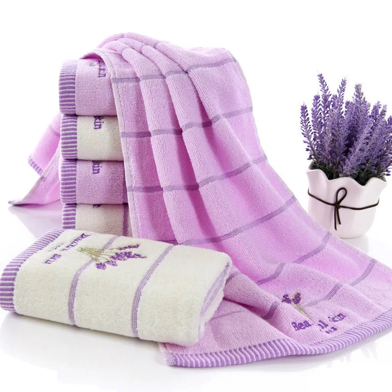 Pure cotton 32 strand embroidered face washing towel 34x74cm in green on a white background