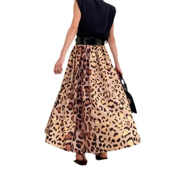 Brown leopard print women's A-line long skirt with a big hem detail on a mannequin.