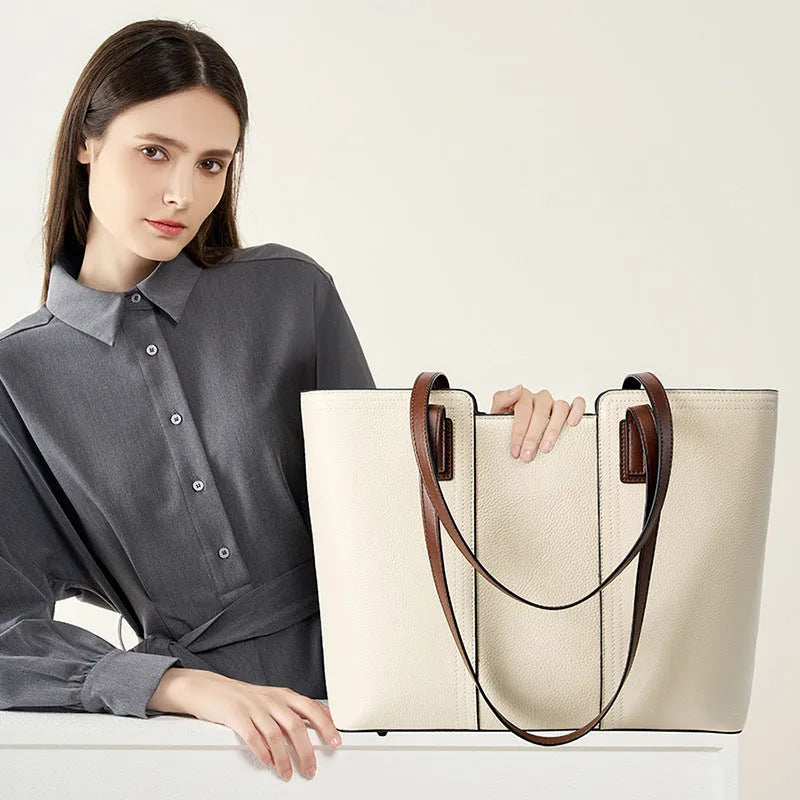 Genuine leather women's crossbody commuter bag in black with internal organisation compartments