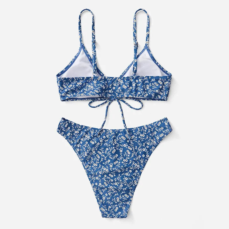 Blue ladies' two-piece swimsuit set with top and shorts on a mannequin.