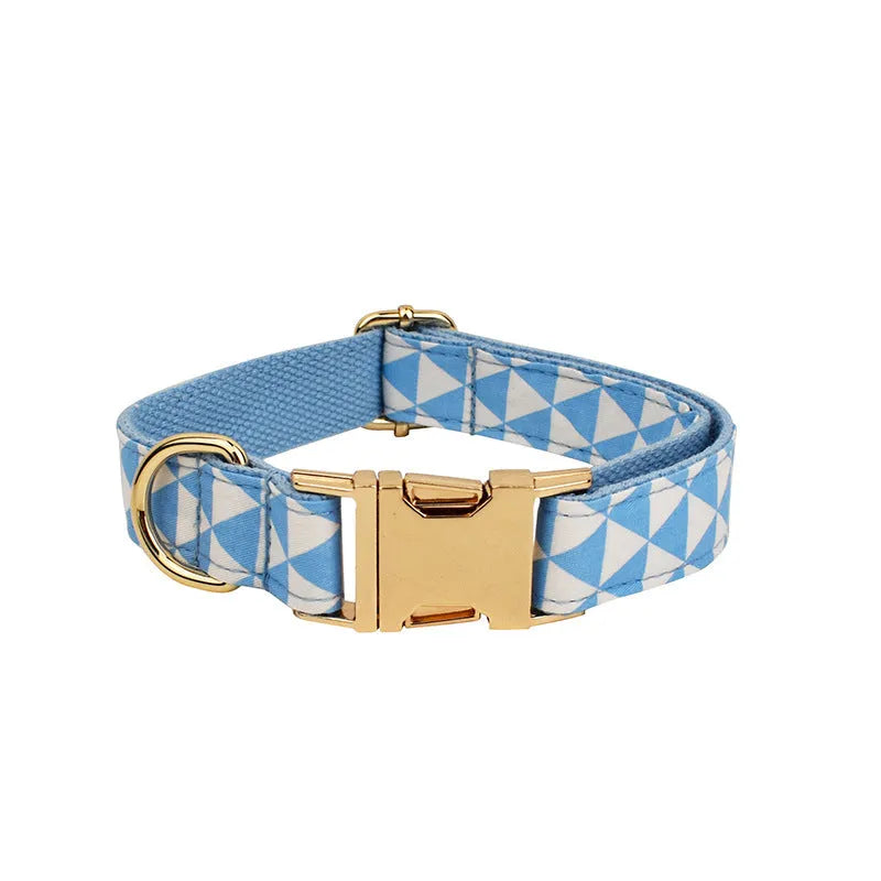Blue triangular ring design dog vest set with matching collar, rope lead, and bow tie accessory