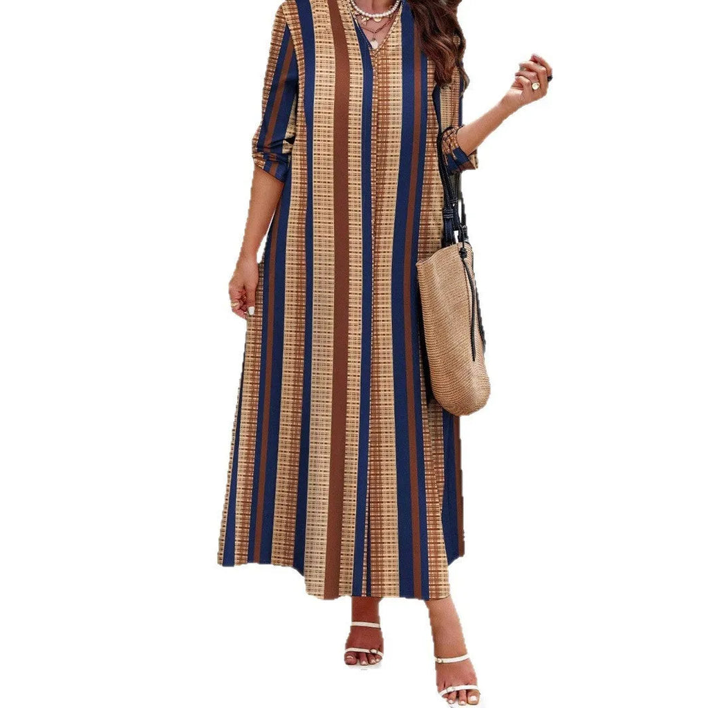Camel coloured women's V-neck striped dress with long sleeves and an A-line skirt.