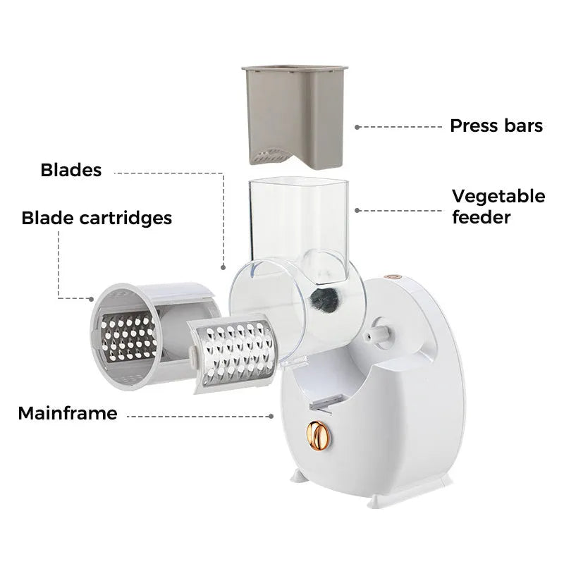 Electric vegetable slicer in white with feeding port, pressing rod, and blade barrel on a kitchen counter