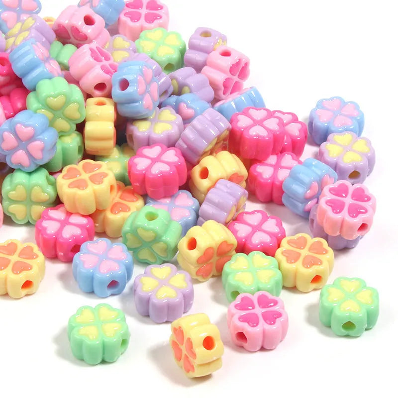 Acrylic four-leaf clover beads in mixed colours with frosted finish, 15mm diameter for jewellery making
