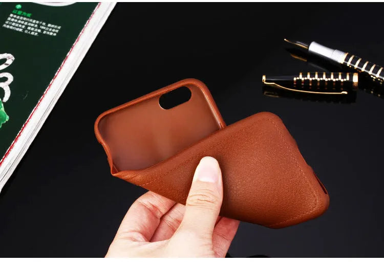 Black leather-style TPU phone case for iPhone 11 Pro Max with precise cutouts for camera and buttons