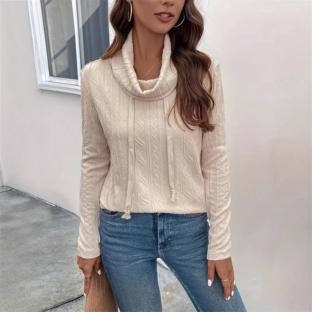 Apricot coloured women's hooded pullover sweater with long sleeves and drawstring adjustment