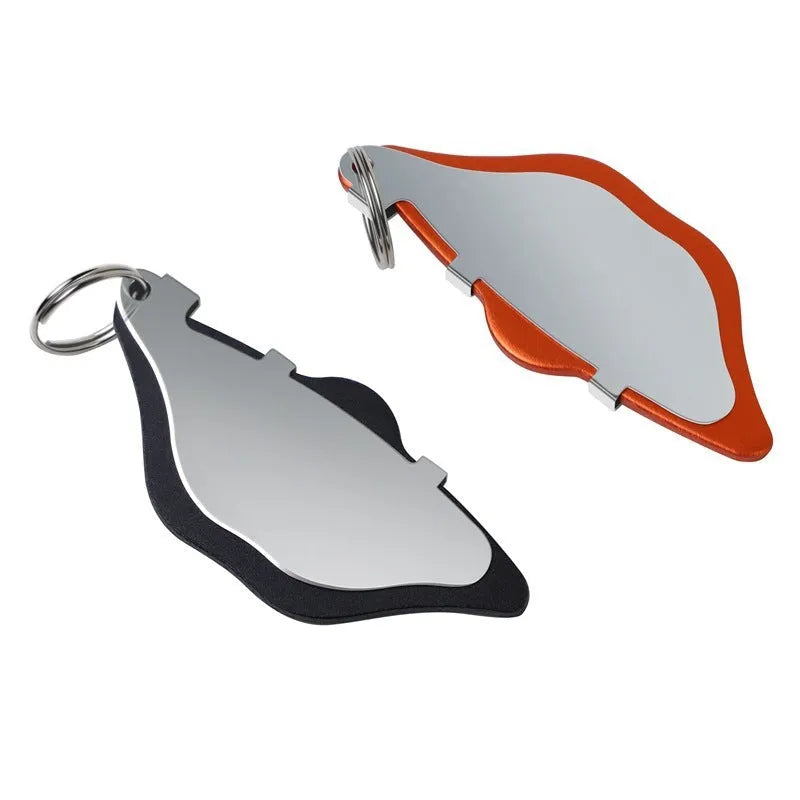 Mountain bike metal disc brake linings in black and orange with adjustment flap