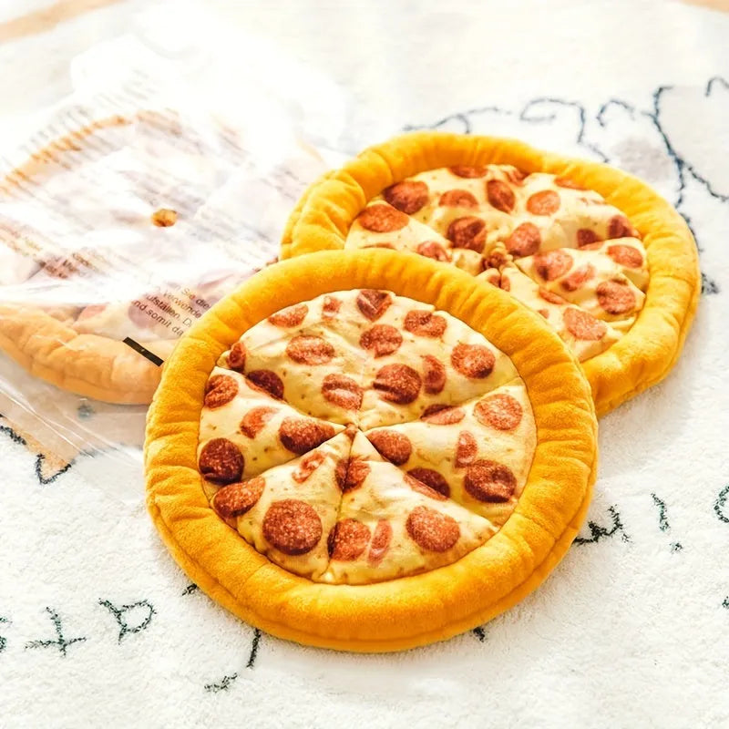 Yellow plush pizza-shaped dog toy with a squeaker inside for chewing and interactive play.