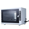 Small silver ultraviolet steriliser cabinet with stainless steel interior for salon tools.