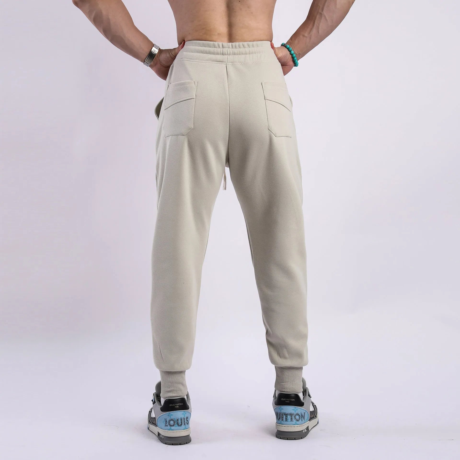 Men's casual ankle-tied drawstring sweatpants in polyester cotton elastic fabric, black colour