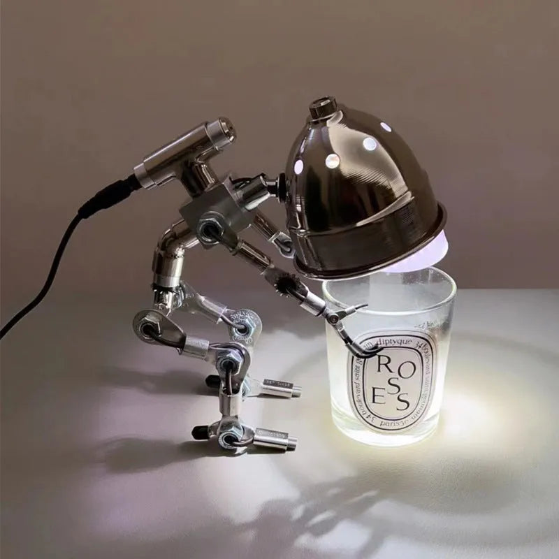 Silver and copper robot night lights showing 22cm and 29cm size options with customisable graphics