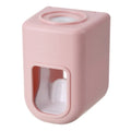 Automatic toothpaste dispenser wall-mounted in blue, with push button and toothpaste nozzle, 9 x 6 x 6 cm