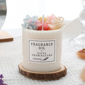 Aromatherapy candle with dried flowers on top, shown in various scent style options.