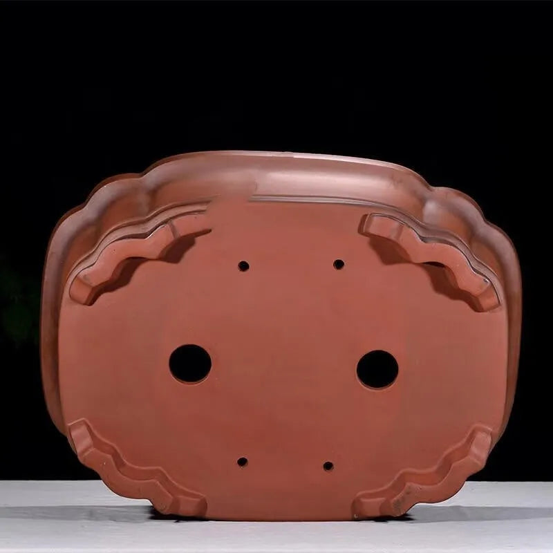 Large antique Chinese style purple clay flower pot with tree stump design and decorative botanical relief