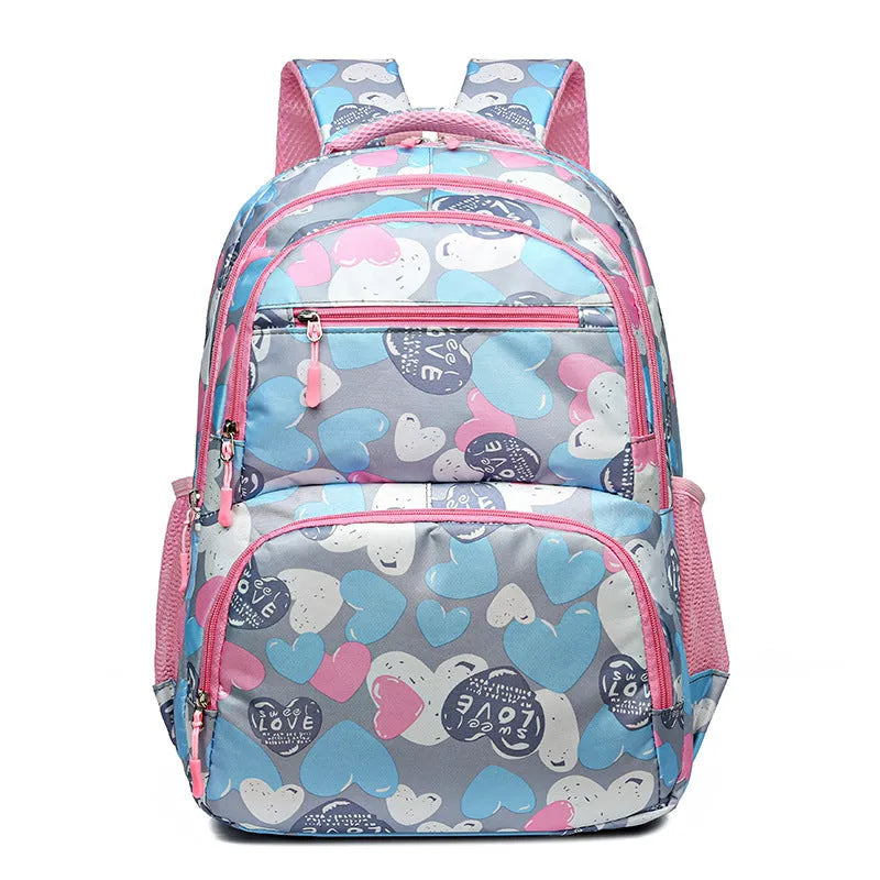 Blue student backpack with air pillow belt system showing shoulder straps and large main compartment