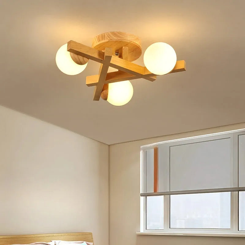 Nordic style wooden ceiling lamp with three light heads emitting neutral colour illumination