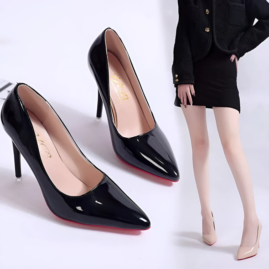 Women's solid colour pointed toe stiletto pump on a white background.