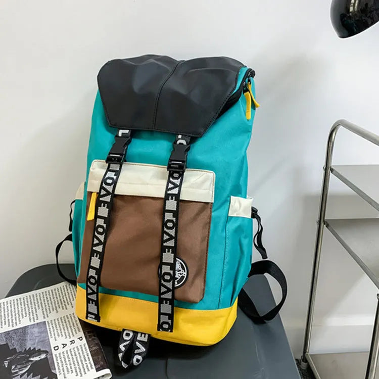 Oxford cloth backpack in black, green, or red with handheld and shoulder straps