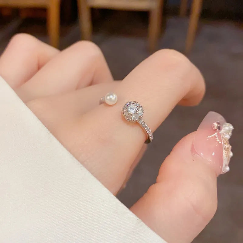 Women's gold plated open-end pearl ring with round zircon geometric design on copper base