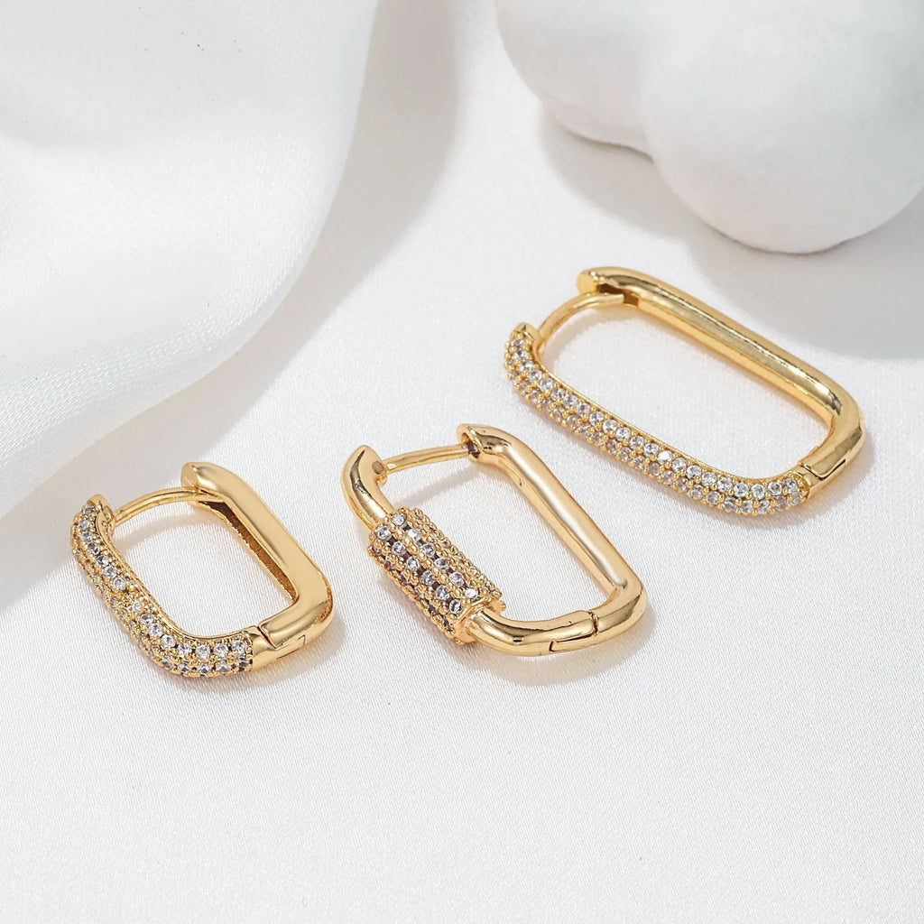 Three geometric ear clips with square design and micro inlaid zircon detailing in gold or white colour options